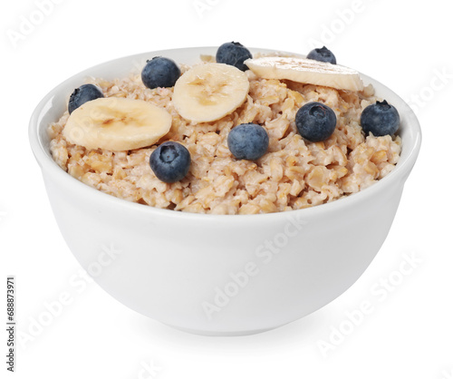 Tasty boiled oatmeal with blueberries and banana in bowl isolated on white