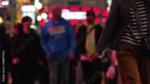 SHINJUKU, TOKYO, JAPAN - NOV 2023 : KABUKICHO downtown area at night. Colorful led neon street signs at entertainment district. Japanese urban nightlife and drinking concept video. Time lapse shot. photo