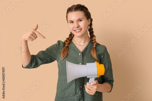 Young woman pointing at meg...