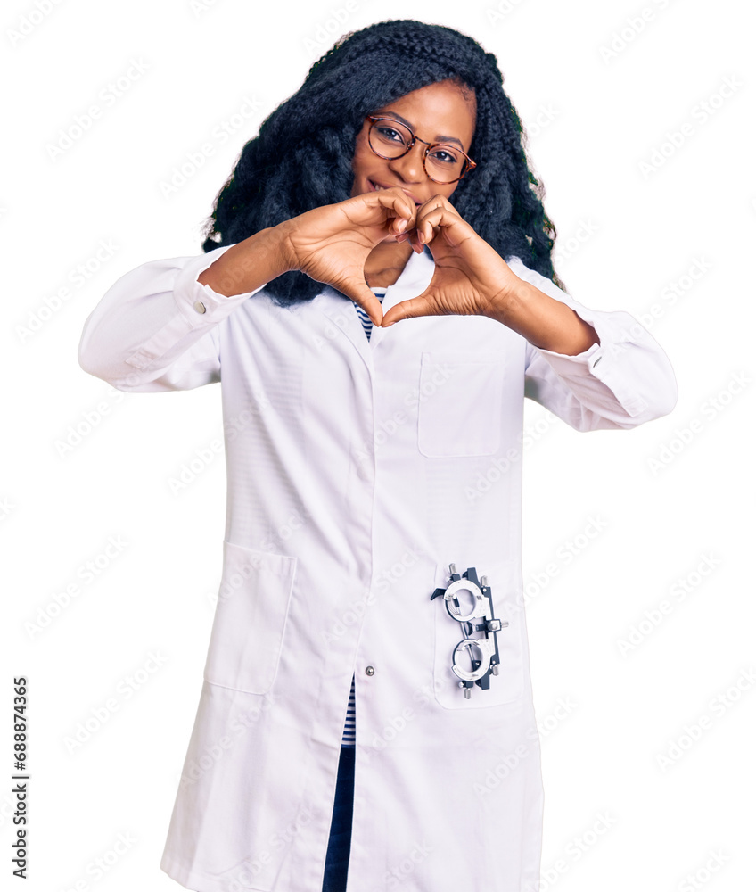 Beautiful african american optician woman with optometry glasses smiling in love showing heart symbol and shape with hands. romantic concept. Beautiful african american optician woman with optometry glasses smiling in love showing heart symbol and shape with hands. romantic concept.