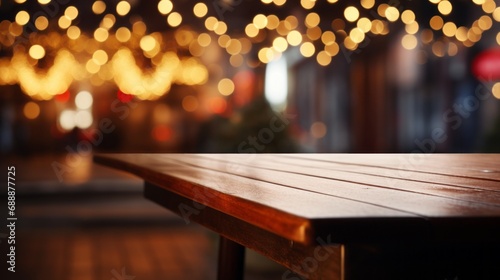 Empty wooden table with blurred Christmas background