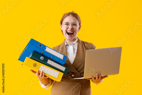 Young businesswoman with do...