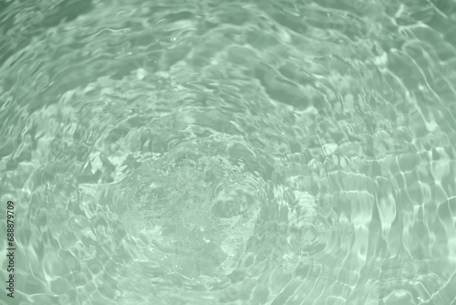 Bluewater bubbles on the surface ripples. Defocus blurred transparent white-black colored clear calm water surface texture with splash and bubbles. Water waves with shining pattern texture background