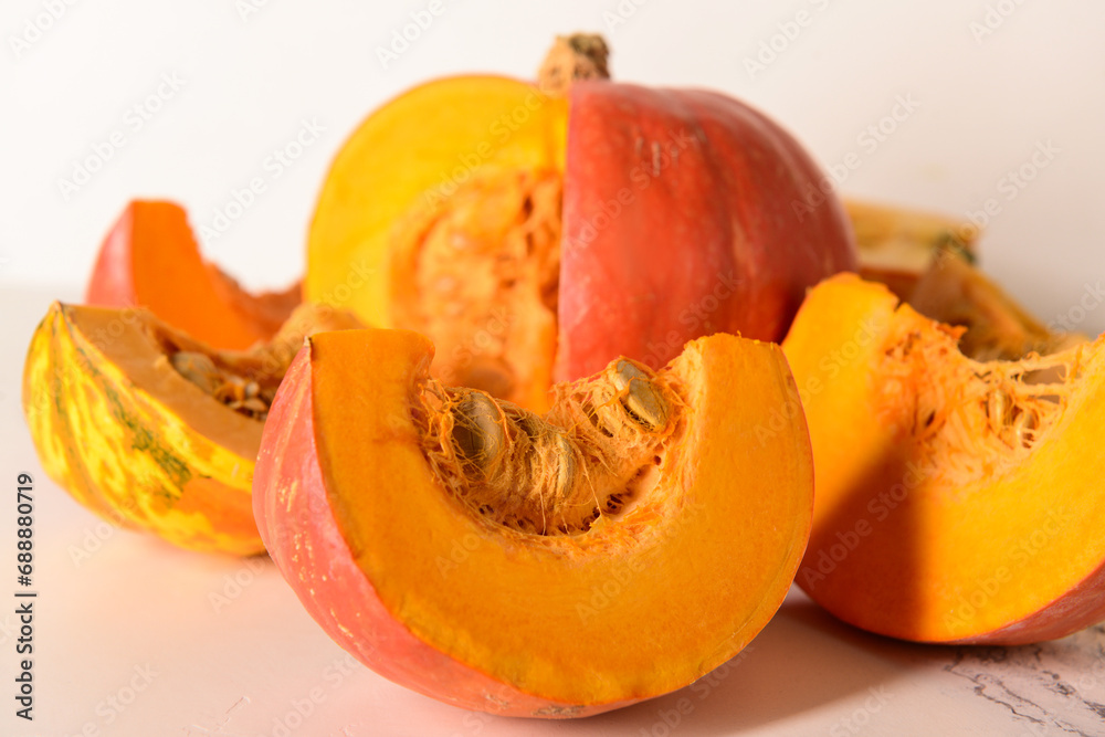 Cut fresh pumpkins on white background Cut fresh pumpkins on white background