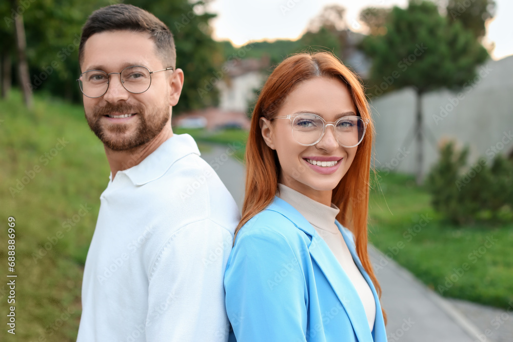 Portrait of happy couple in glasses outdoors Portrait of happy couple in glasses outdoors
