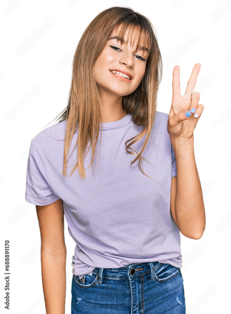 Teenager caucasian girl wearing casual clothes showing and pointing up with fingers number two while smiling confident and happy.