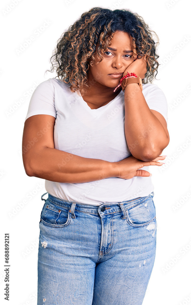 Young african american plus size woman wearing casual clothes thinking looking tired and bored with depression problems with crossed arms. Young african american plus size woman wearing casual clothes thinking looking tired and bored with depression problems with crossed arms.
