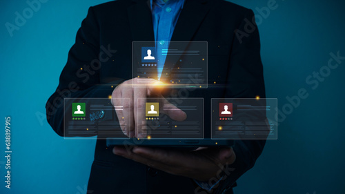 Fototapeta Naklejka Na Ścianę i Meble -  Human Resources. businessman looking candidate profile to find human for business CRM or Customer Relation Management,  training, employment, practice. Internet Human resource management.