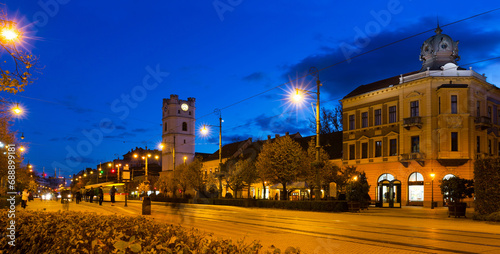 View of night streets of Debrecen with Small Reformed Church, Hungary