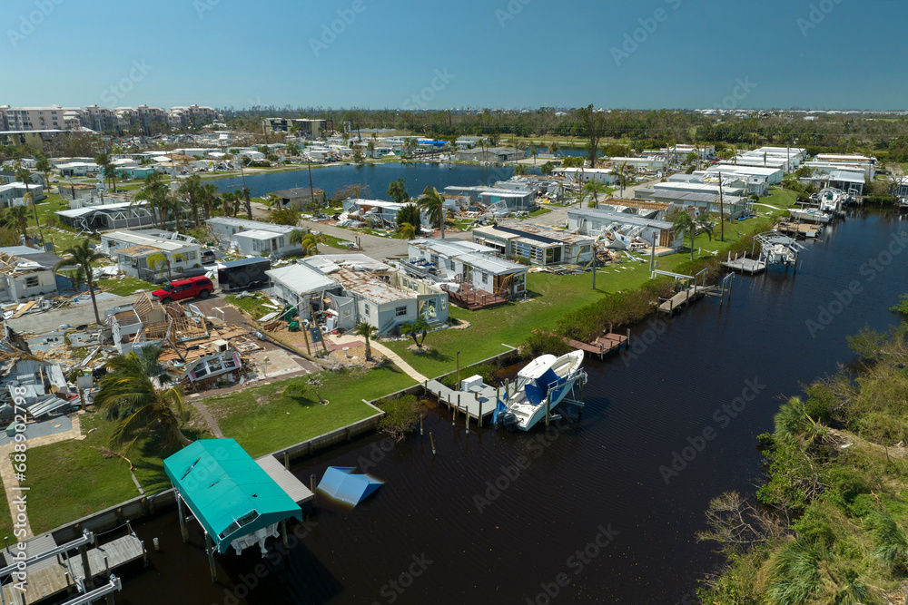Aerial view of badly damaged mobile homes after hurricane Ian swept through residential area in Florida. Aftermath of natural disaster