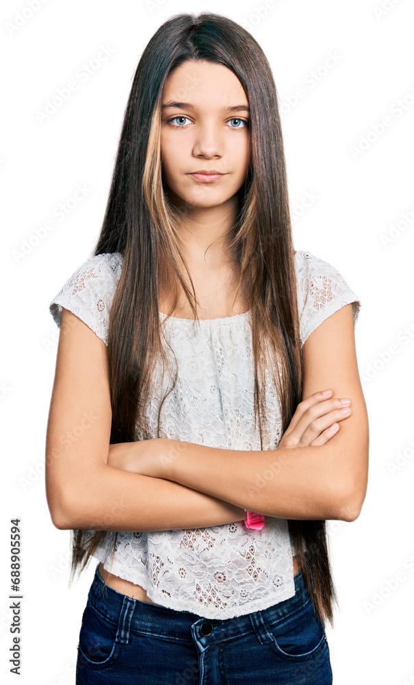 Young brunette girl with long hair wearing white shirt skeptic and nervous, disapproving expression on face with crossed arms. negative person. Young brunette girl with long hair wearing white shirt skeptic and nervous, disapproving expression on face with crossed arms. negative person.
