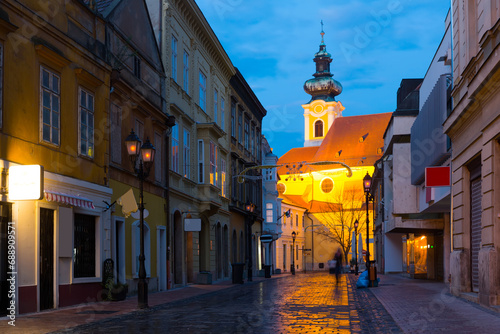 Photo of night streets in hungarian city Gyor outdoor. photo