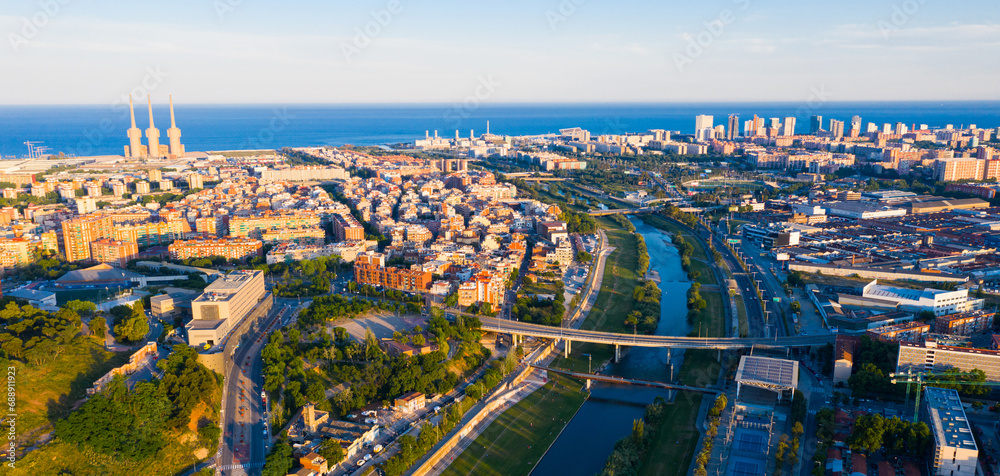 Top view on Barcelona and district Sant Adria de Besos, Besos river. Spain