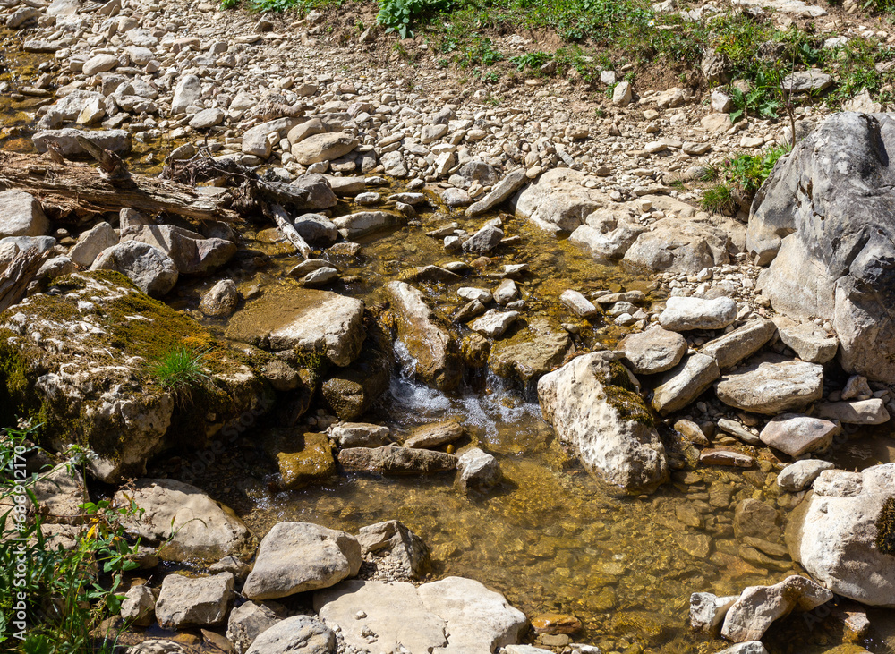 mountainous terrain, shallow river, sunny day, autumn walks in the bosom of nature, panorama of the area. mountainous terrain, shallow river, sunny day, autumn walks in the bosom of nature, panorama of the area.