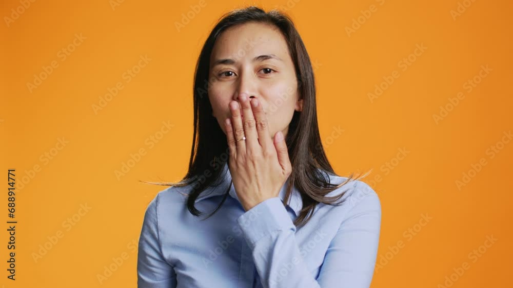 Confident filipino person sending air kisses on camera, expressing cute friendly gesture in studio and posing over background. Attractive woman showing romance and love, flirty smile. Confident filipino person sending air kisses on camera, expressing cute friendly gesture in studio and posing over background. Attractive woman showing romance and love, flirty smile.