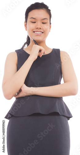 Digital png photo of happy asian businesswoman with pen, looking down on transparent background