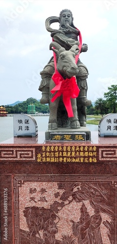 The actaeon statue on the way leading to the Xiangtiang God statue, Zuoying Yuandi Temple at Lotus Pond in Zuoying district,Kaohsiung City, Taiwan photo