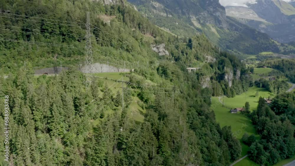 The drone camera is moving forward, and far ahead are several low-rise buildings The drone camera is moving forward, and far ahead are several low-rise buildings