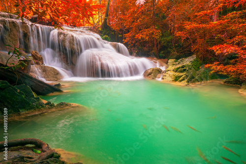 Hot Springs Onsen Natural Bath is Surrounded by red-yellow leaves. In fall leaves, Waterfall among many foliages, In fall leaves Leaf color change © Pongvit
