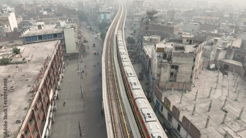 Aerial perspective of Lahore's Orange Line, particularly above the bridge connecting the city. Aerial perspective of Lahore's Orange Line, particularly above the bridge connecting the city.