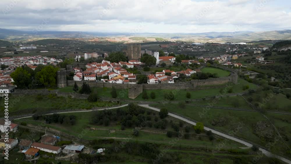 Drone descend tilt up jib of medieval castle in historic center of Braganza Portugal Drone descend tilt up jib of medieval castle in historic center of Braganza Portugal