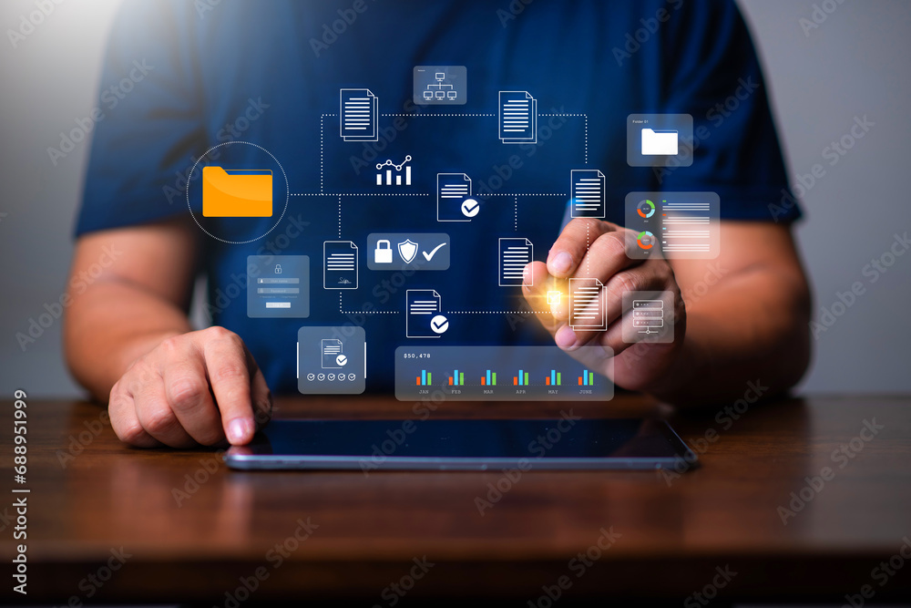 Document management system concept, Man using laptop with document icon concept for online document database. server, online storage. Document management system concept, Man using laptop with document icon concept for online document database. server, online storage.