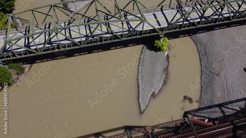 Drone flying above bridges on the Nooksack River, Washington State photo