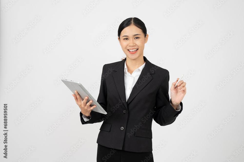 Beautiful Asian businesswoman holding tablet, using tablet with white isolated background. Beautiful Asian businesswoman holding tablet, using tablet with white isolated background.