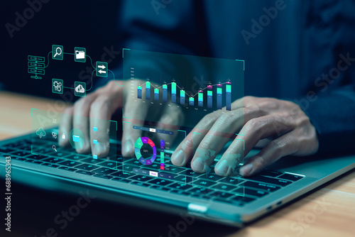 analyst manages the system database and shows a dashboard chart on the computer. concept analysis data plan, analytics business, and report. research on platform digital technology 
