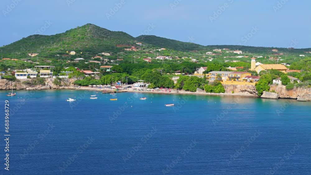 Playa piskado and Misa di San Pedro or Saint Peter's Church, aerial establishing view of Curacao Playa piskado and Misa di San Pedro or Saint Peter's Church, aerial establishing view of Curacao
