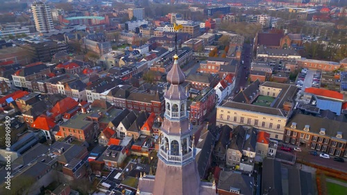 Den Bosch orbit to left with church spire in centre during cold winter day photo