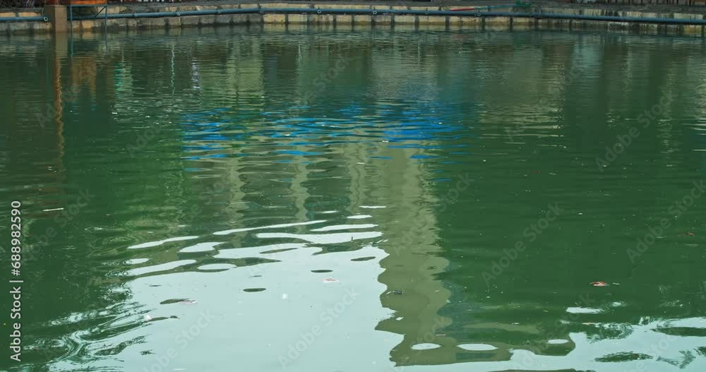 Reflection in the water of the basin of the ancient complex emir's summer residence Sitorai Mohi Xosa. Reflection in the water of the basin of the ancient complex emir's summer residence Sitorai Mohi Xosa.