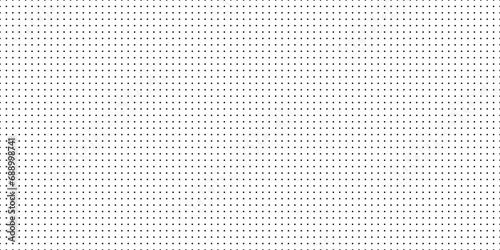 Dotted graph paper with grid. Polka dot pattern, geometric seamless texture for calligraphy drawing or writing. Blank sheet of note paper, school notebook. Vector illustration photo