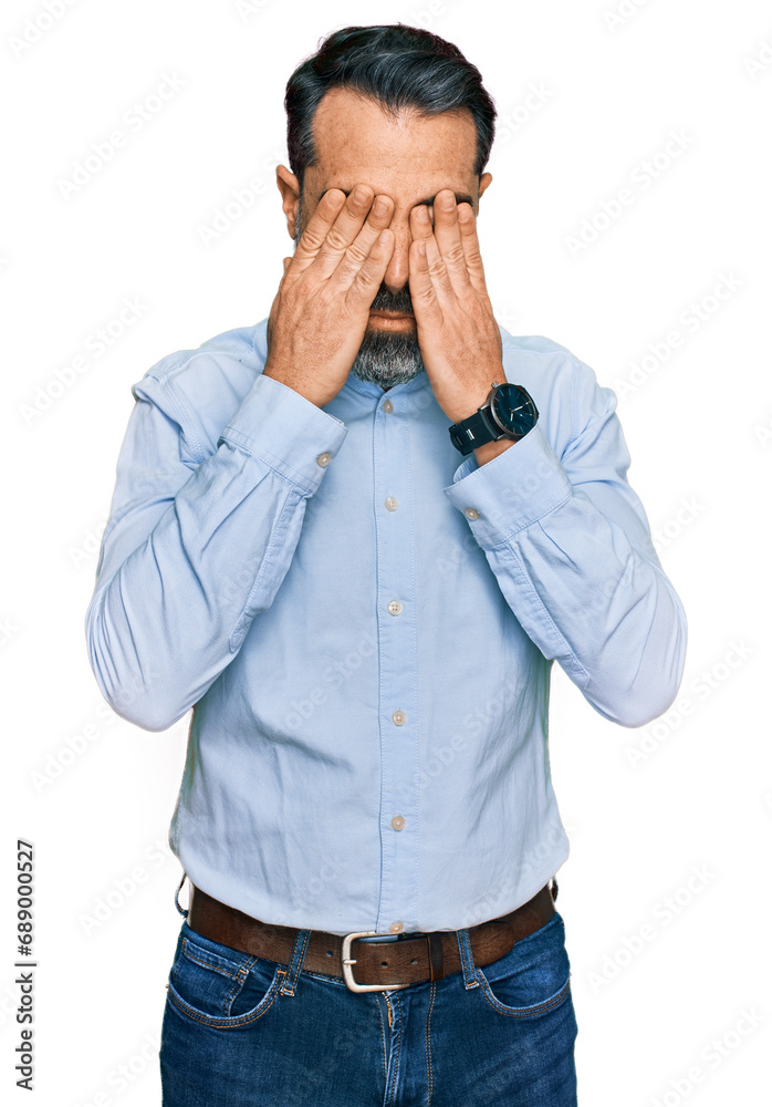 Middle aged man with beard wearing business shirt rubbing eyes for fatigue and headache, sleepy and tired expression. vision problem Middle aged man with beard wearing business shirt rubbing eyes for fatigue and headache, sleepy and tired expression. vision problem