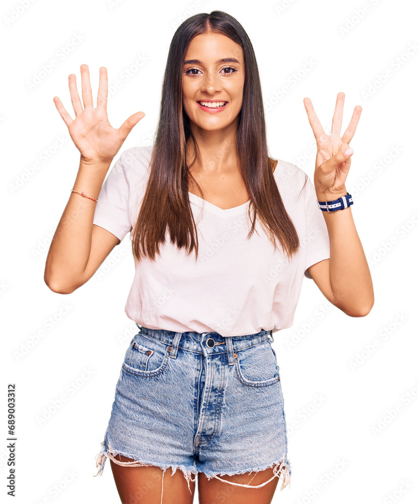 Young hispanic woman wearing casual white tshirt showing and pointing up with fingers number eight while smiling confident and happy. Young hispanic woman wearing casual white tshirt showing and pointing up with fingers number eight while smiling confident and happy.