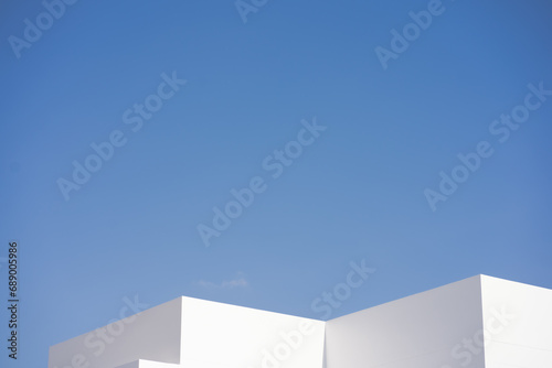 architecture and landscape concept with white building with clear sky background