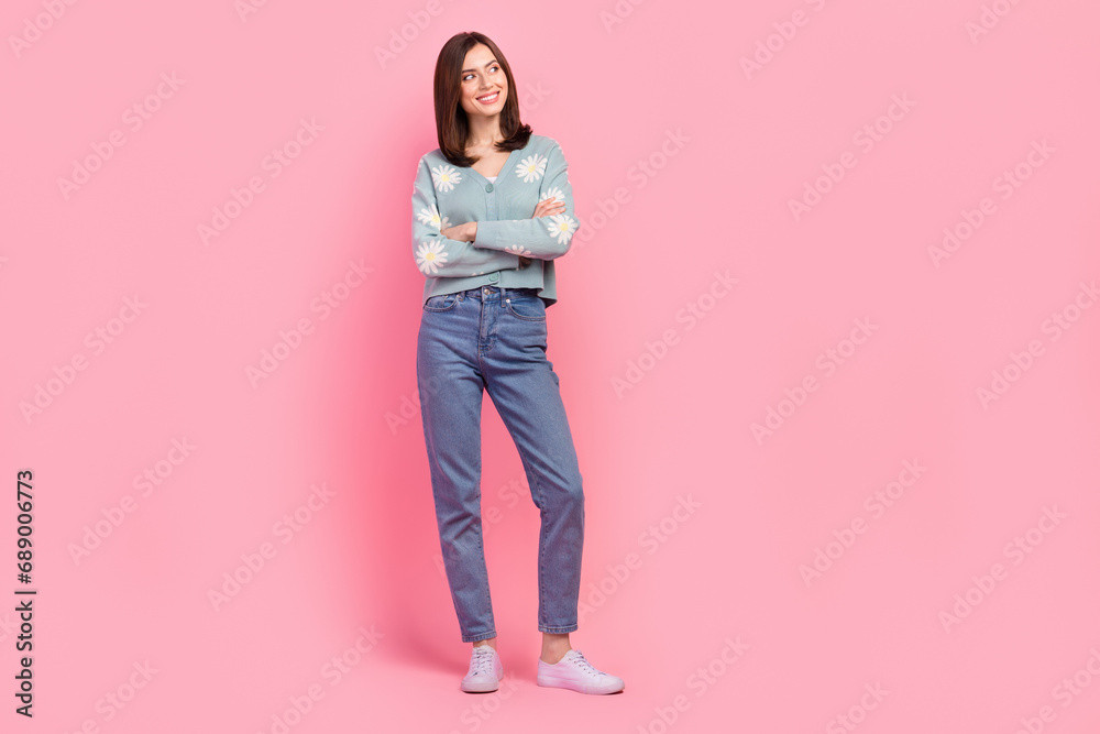 Full length body size photo of worker lady with folded arms look side wear cardigan jeans shoes isolated pink color background Full length body size photo of worker lady with folded arms look side wear cardigan jeans shoes isolated pink color background