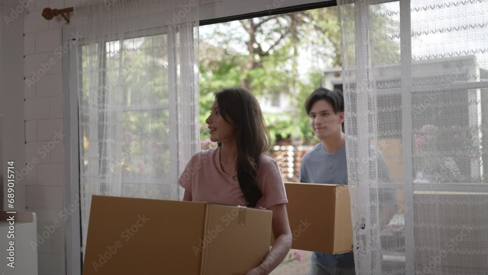 Delivery man move items to the house. Delivery man move items to the house.