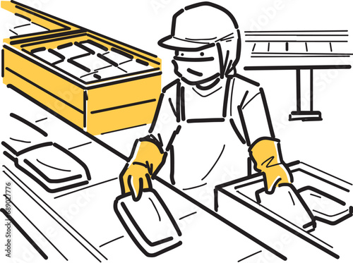 食品関係の流れ作業で働く社員