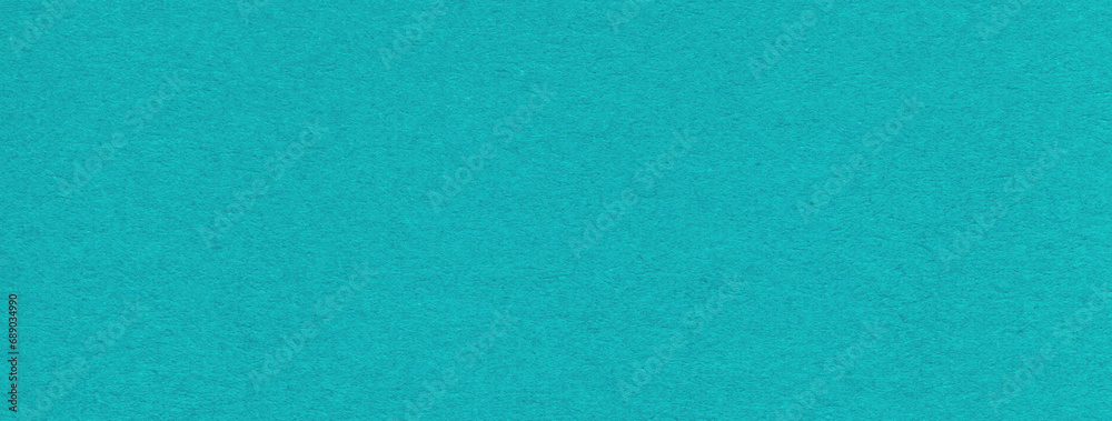 Texture of craft blue and turquoise paper background colors, macro. Structure of vintage cerulean cardboard.