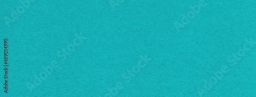 Texture of craft blue and turquoise paper background colors, macro. Structure of vintage cerulean cardboard.