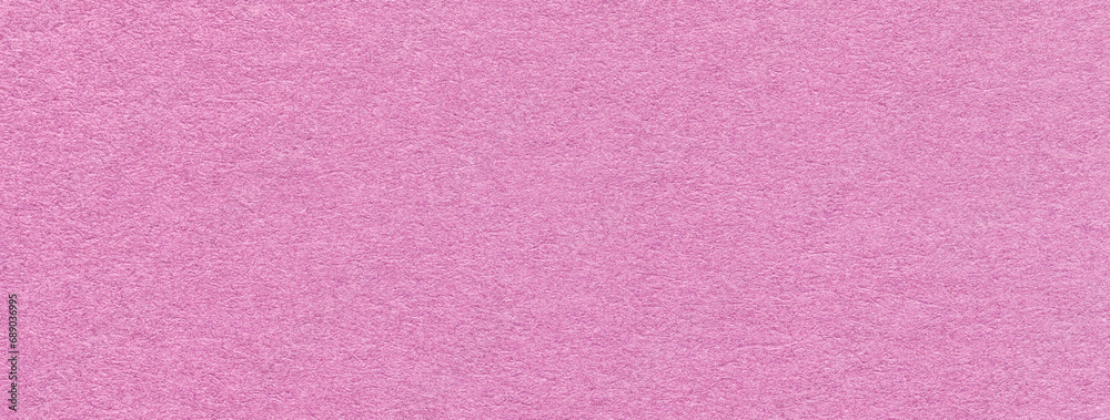 Texture of craft lilac and rose paper background, macro. Structure of vintage dense kraft pink cardboard. Texture of craft lilac and rose paper background, macro. Structure of vintage dense kraft pink cardboard.