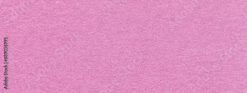 Texture of craft lilac and rose paper background, macro. Structure of vintage dense kraft pink cardboard.