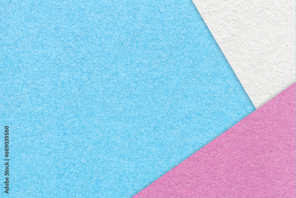 Texture of craft light blue color paper background with white and pink border. Vintage abstract sky cardboard. Texture of craft light blue color paper background with white and pink border. Vintage abstract sky cardboard.