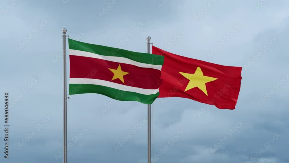 Vietnam and Suriname flag waving together on cloudy sky, endless seamless loop