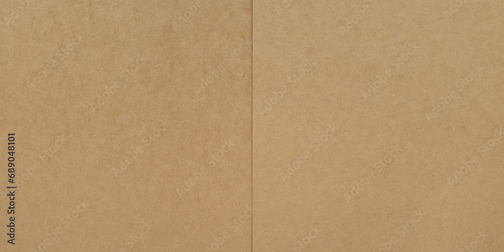 Brown paper made from kraft pulp. Natural texture, background Brown paper made from kraft pulp. Natural texture, background