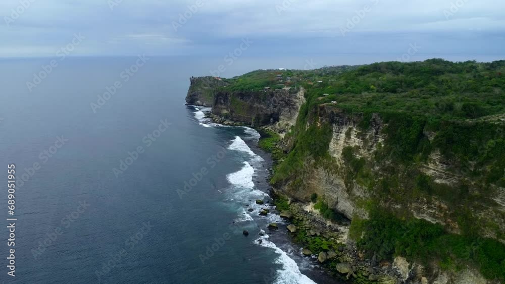 Aerial View By Drone 4K Camera. Ocean With Waves And Rocky Cliff. Aerial View By Drone 4K Camera. Ocean With Waves And Rocky Cliff.