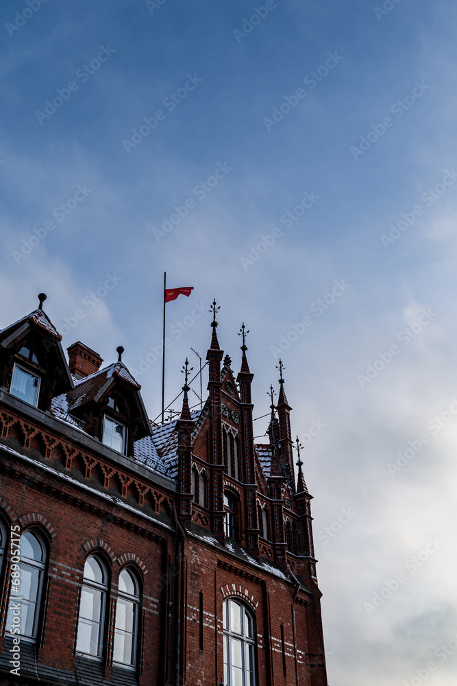 Iconic Skylines: Tall Building with Red Flag, Bydgoszcz, Poland