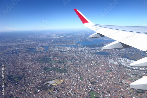 Perth View from Airplane with many houses and the city below