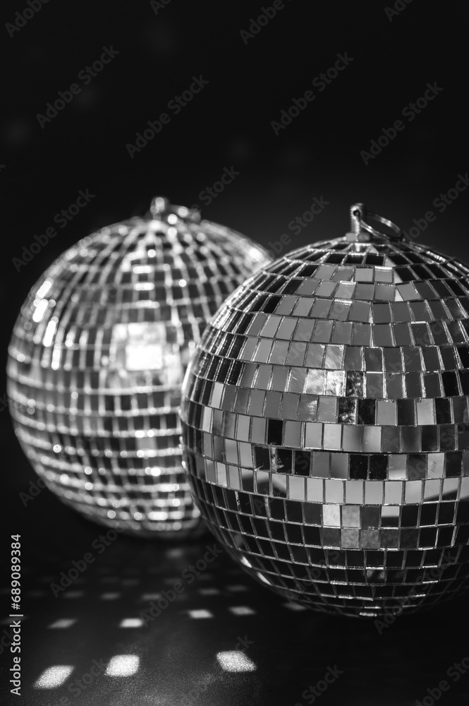 Obraz premium disco balls on a black background
